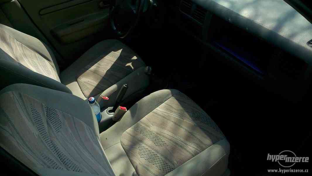 Mazda Demio 1.3i 16V, r.v 1999 - foto 4