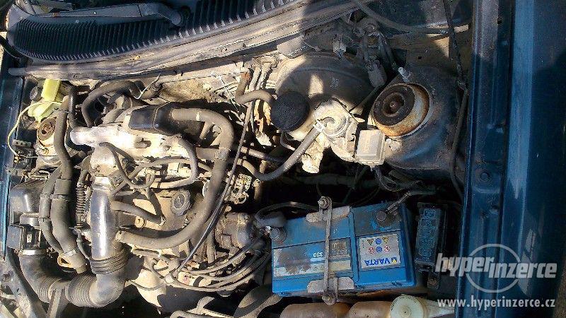 Mazda Demio 1.3i 16V, r.v 1999 - foto 9